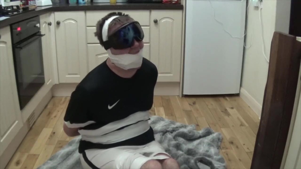 Footballer bound and gagged tight in duct tape 3
