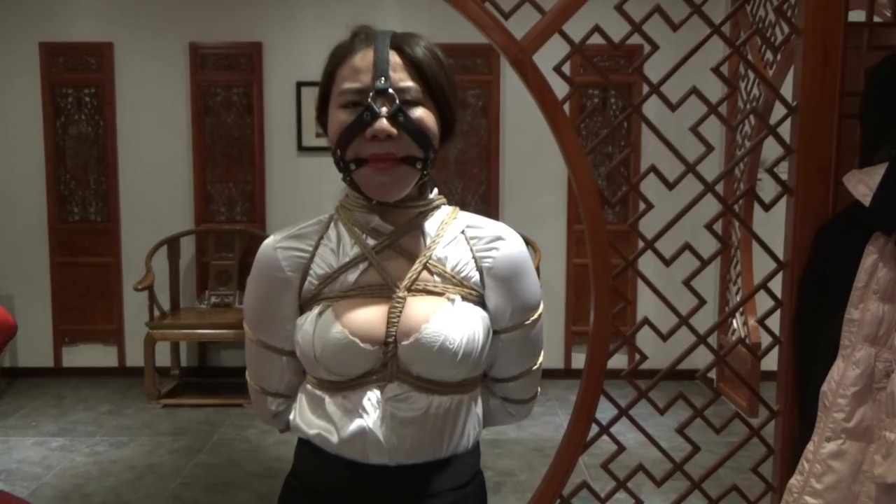 Gagged And Bound Asian Woman
