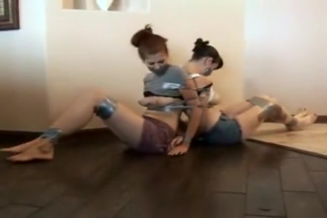 Natalie and Morgan taped up by intruder
