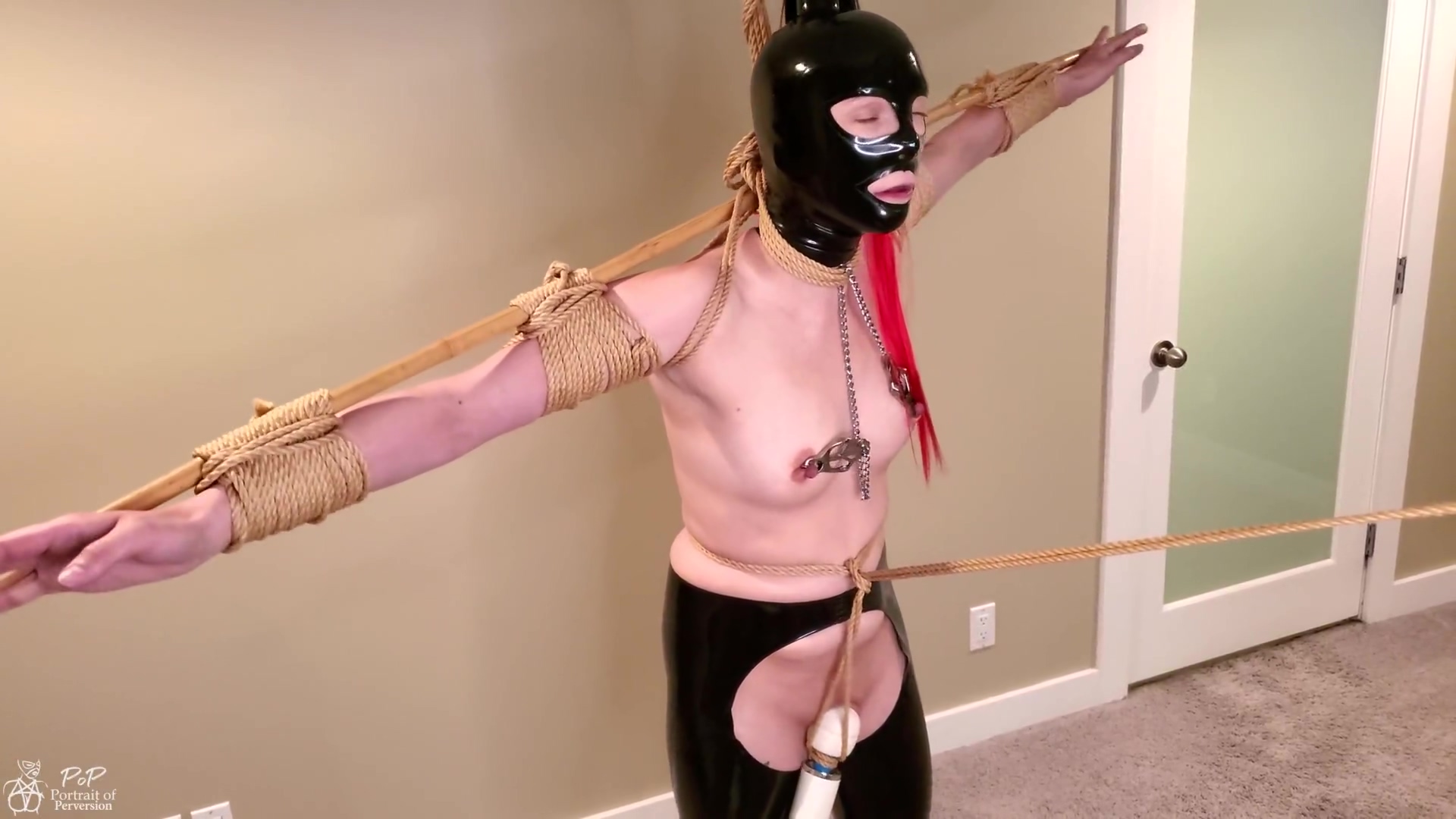 Latex Sub Stress Tied On Tiptoes In Predicament Bondage With A Crotch Rope Is Made To Cum Hard
